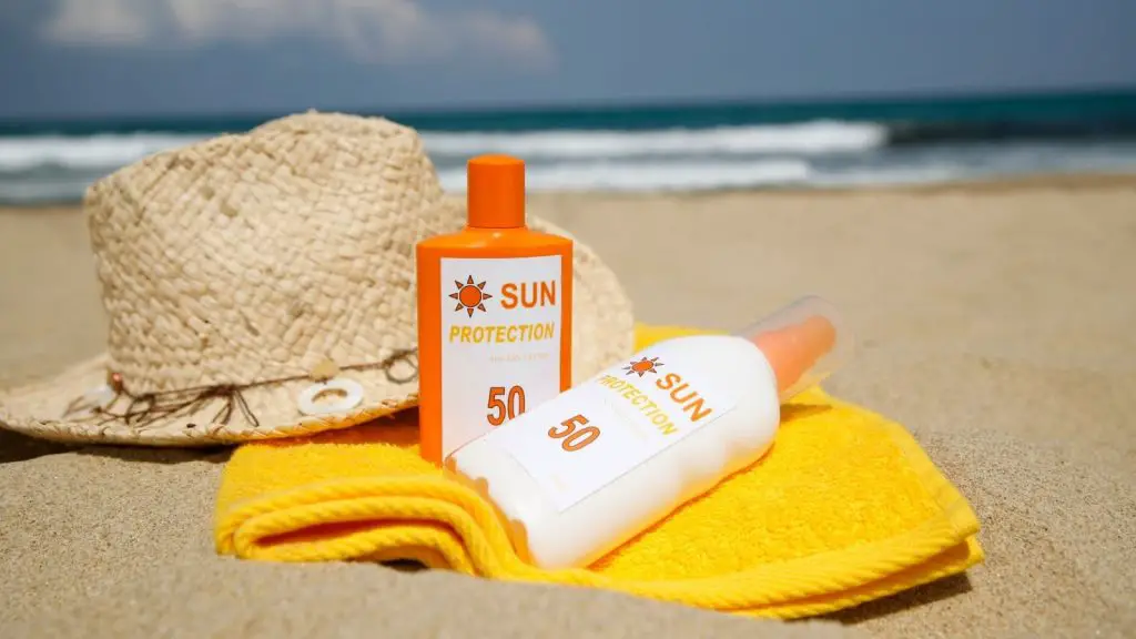 tanning lotion and sunscreen on the beach