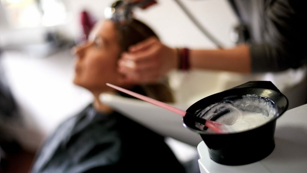 women Diluting her Hair Dye