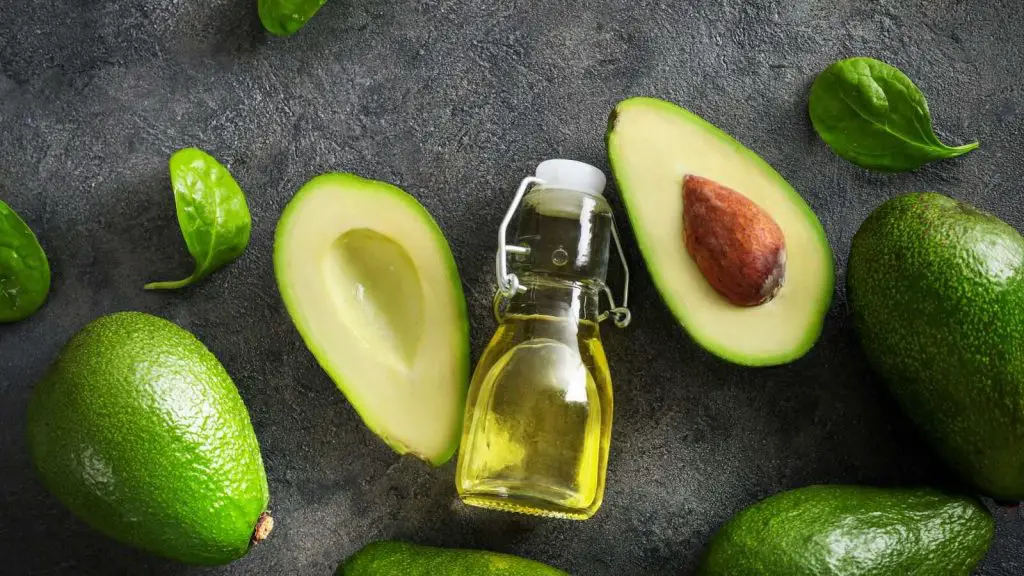 Avocados and avocado oil in a bottle