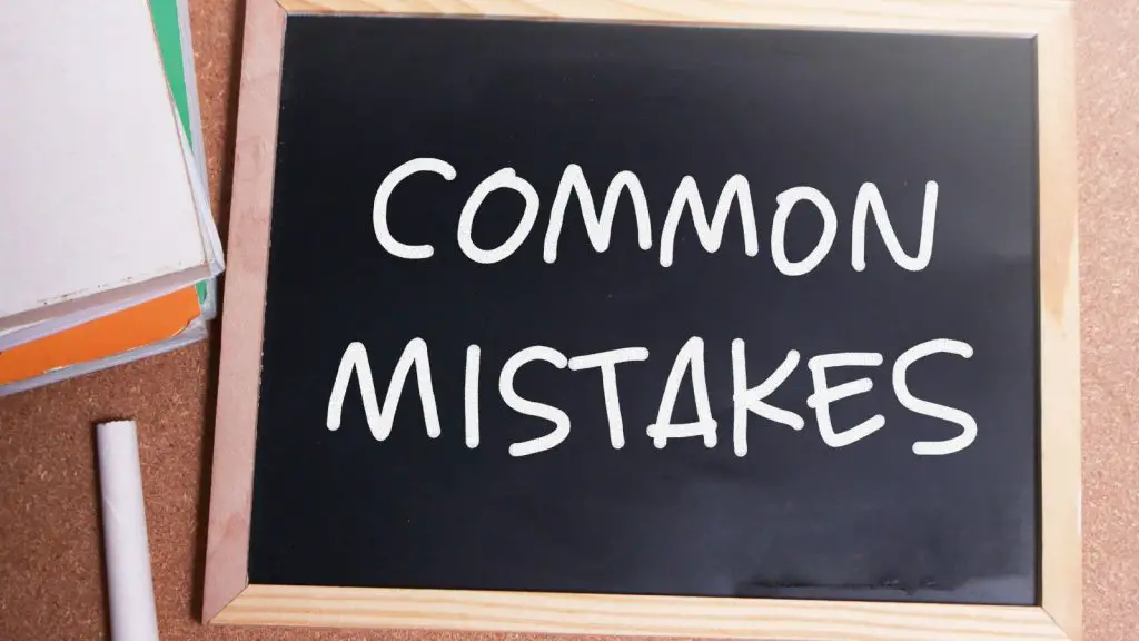 Common mistakes written with chalk on a black board